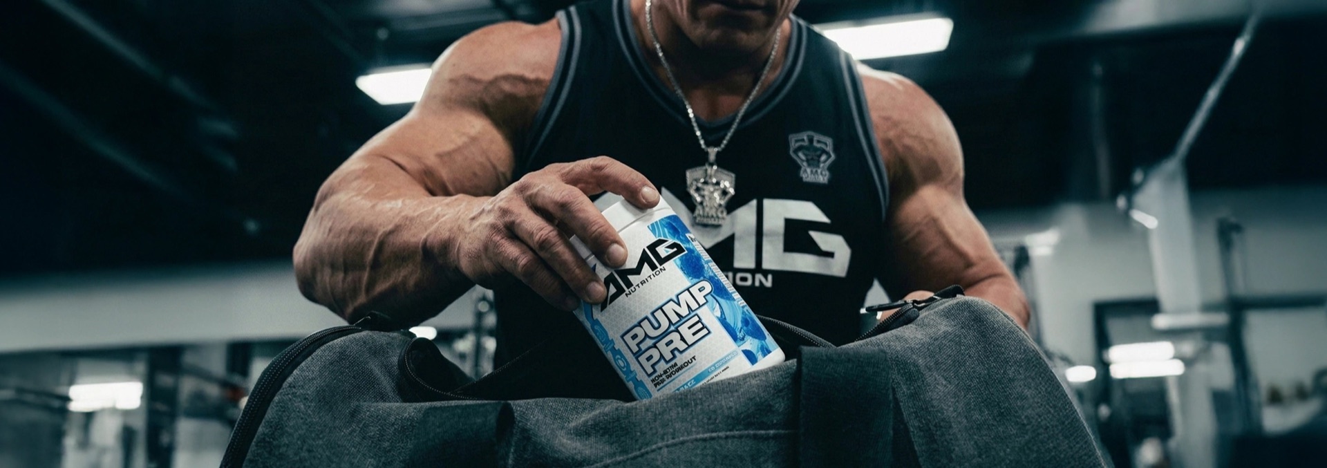Athlete with AMG Nutrition Pump Pre in the gym — campaign photography by Thiago Gomes
